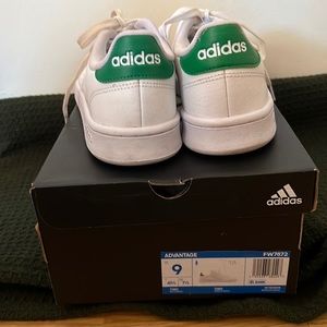 Adidas Advantage with green backs